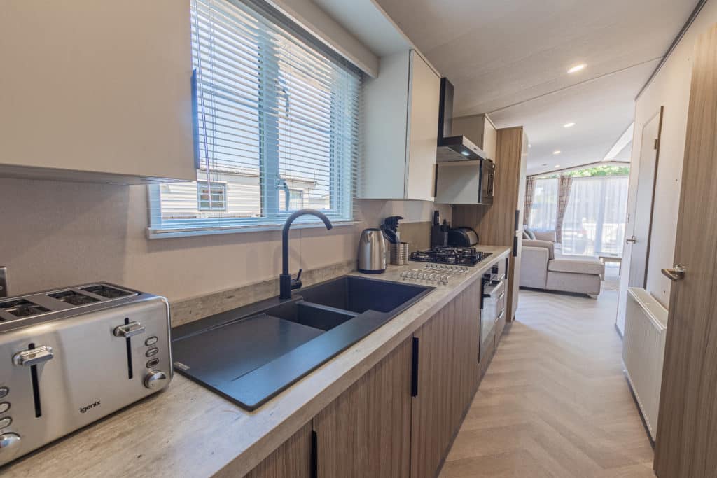Oakcliff's Lapwing Mini Lodge fully-fitted, modern kitchen