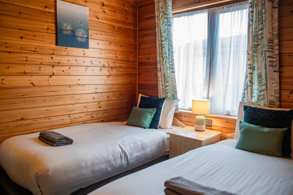 Oakcliff's Pine Lodge twin bedroom