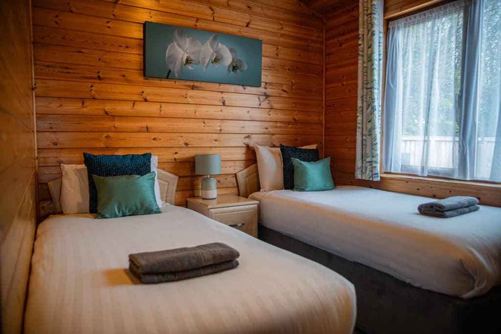 Oakcliff's Pine Lodge twin bedroom