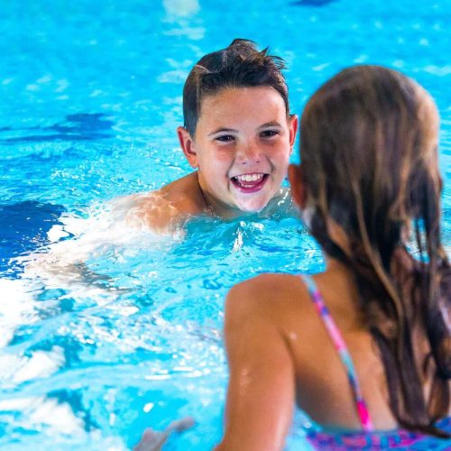 Two children in a swimming pool