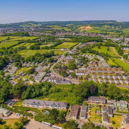 A drone view of Oakcliff Holiday Park. Showing lodges, caravans and cottages.
