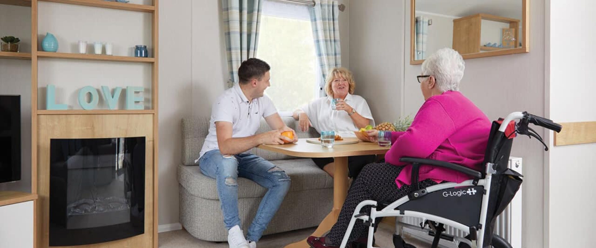 People enjoying Oakcliff's Disabled Friendly Caravan