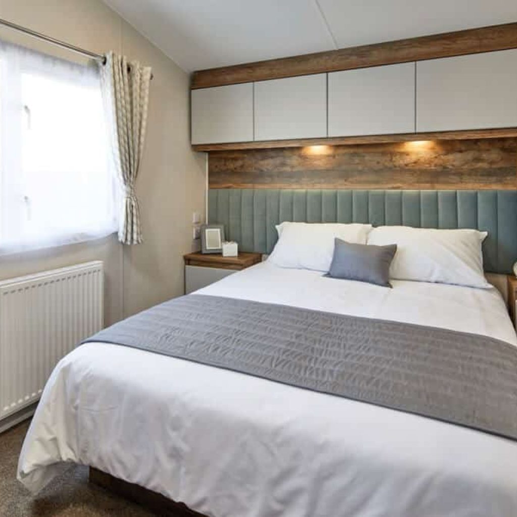 Oakcliff's Lapwing Plus Mini Lodge spacious double bedroom.