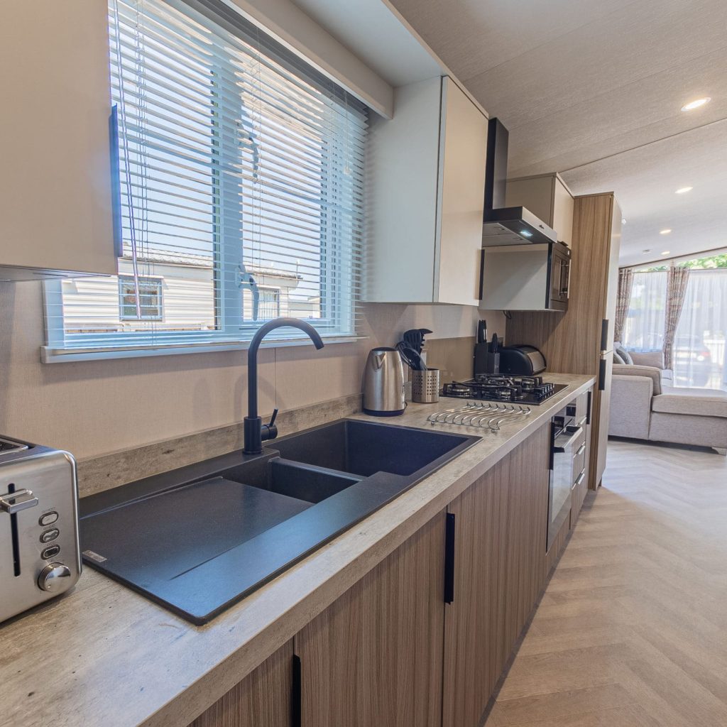 Oakcliff's Lapwing Mini Lodge fully-fitted, modern kitchen