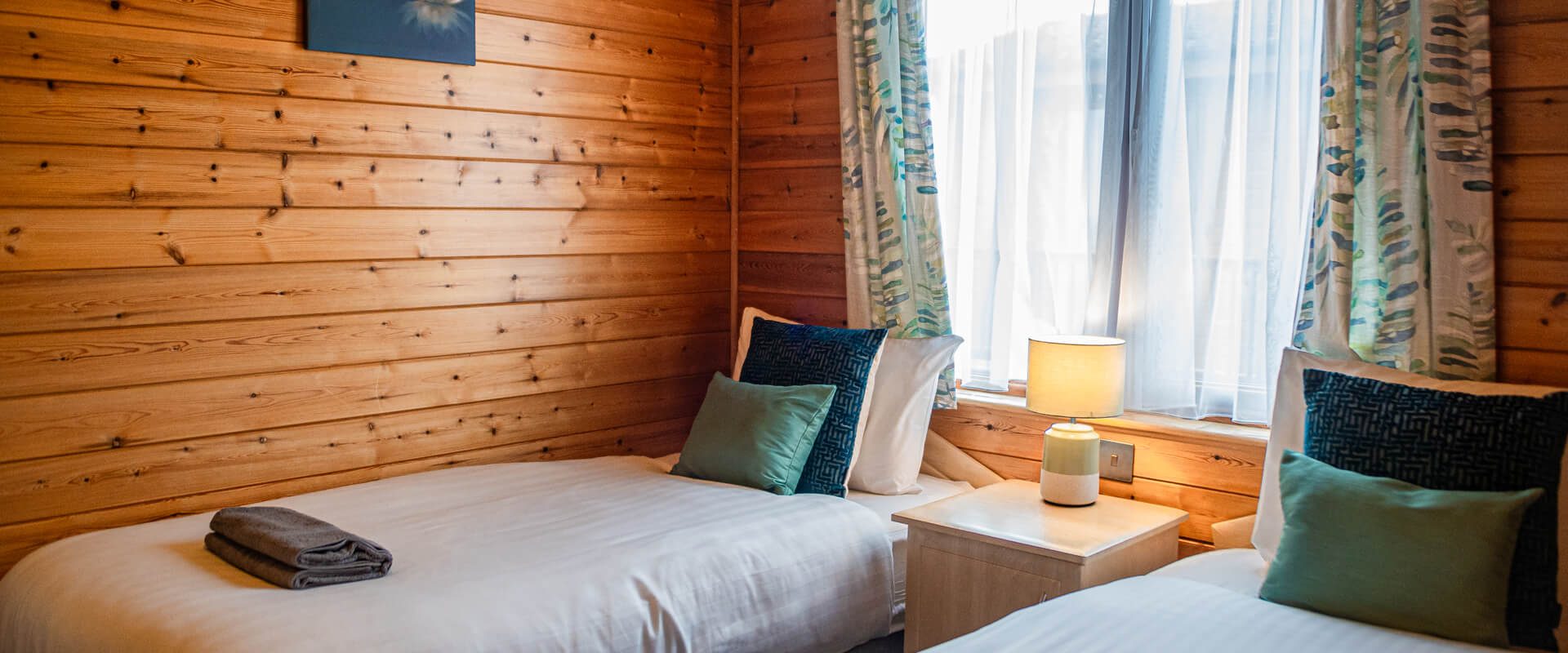 Oakcliff's Pine Lodge twin bedroom