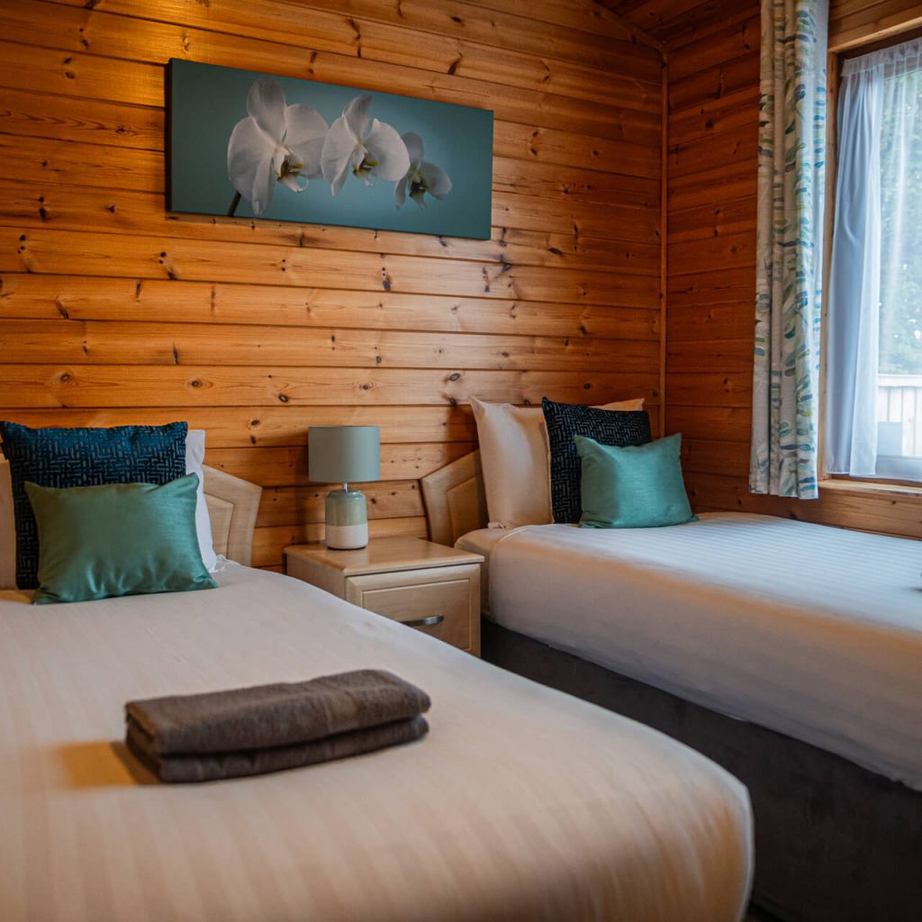 Oakcliff's Pine Lodge twin bedroom