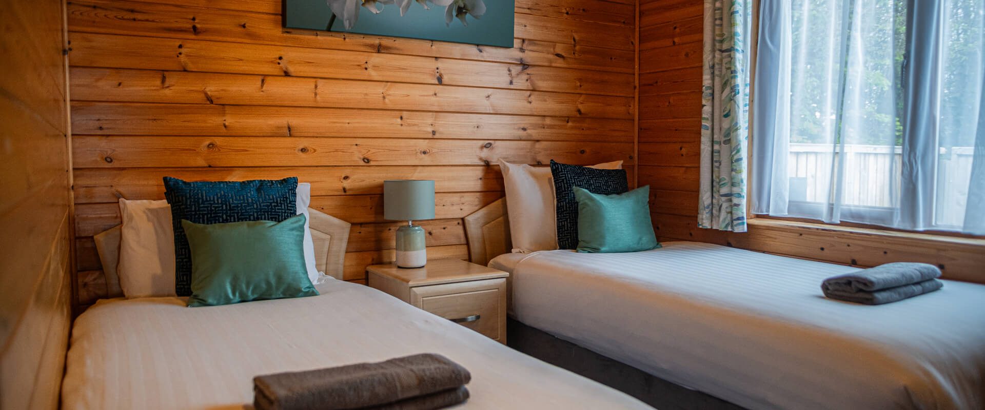 Oakcliff's Pine Lodge twin bedroom